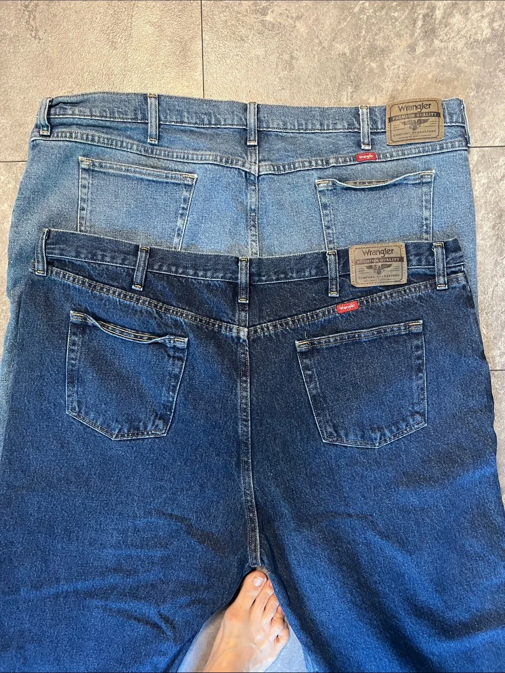 2 pairs of Wrangler Men's Straight Jeans in Dark Indigo & Light Blue used  46”